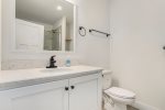 The Master Suite Boasts an Immaculate Ensuite Bathroom Ideal for Freshening Up after a Day Out in SoHa